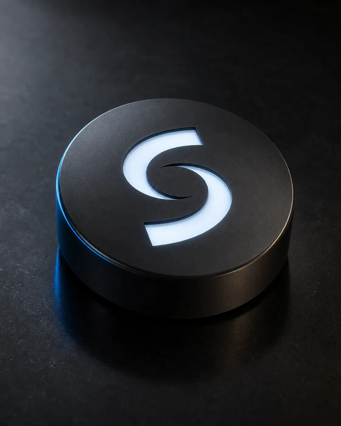 Shift Puck on wall — tap to make your smartphone dumb on command